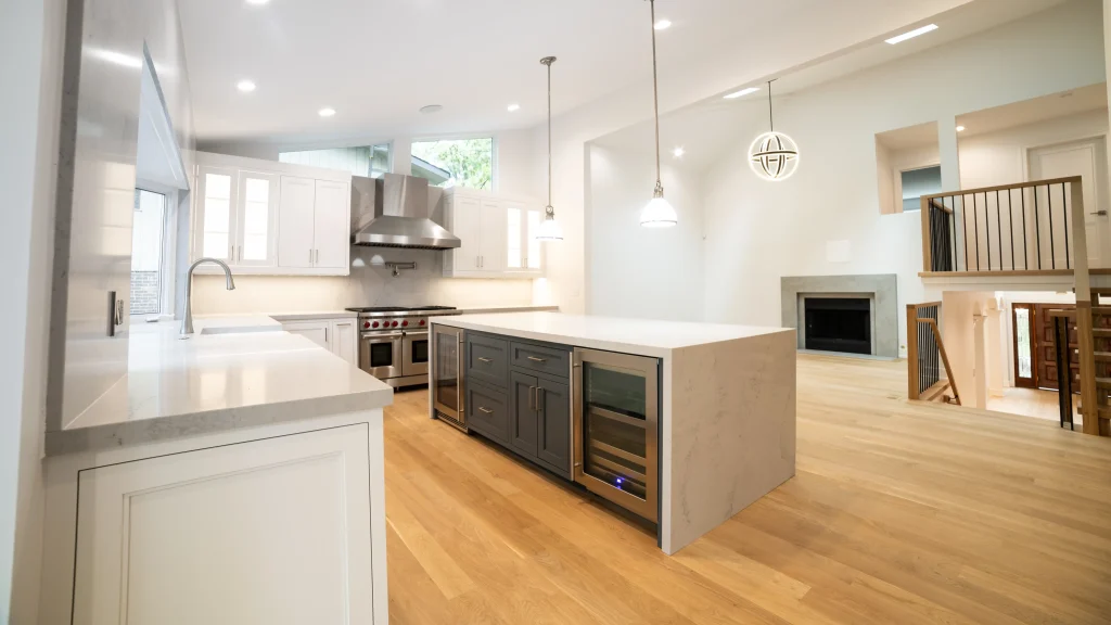 Modern kitchen with sleek white cabinetry and large center island
